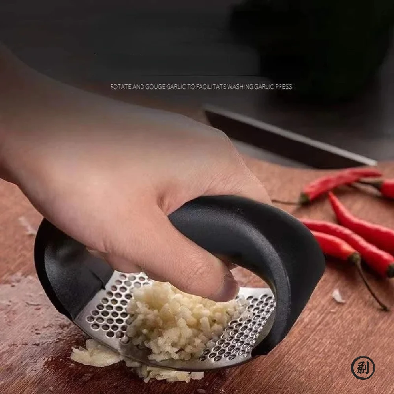 Stainless Steel Garlic Press C - Kitchen Gadgets List reseña y precio