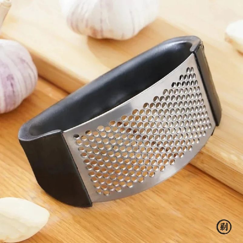 Stainless Steel Garlic Press C - Kitchen Gadgets List reseña y precio